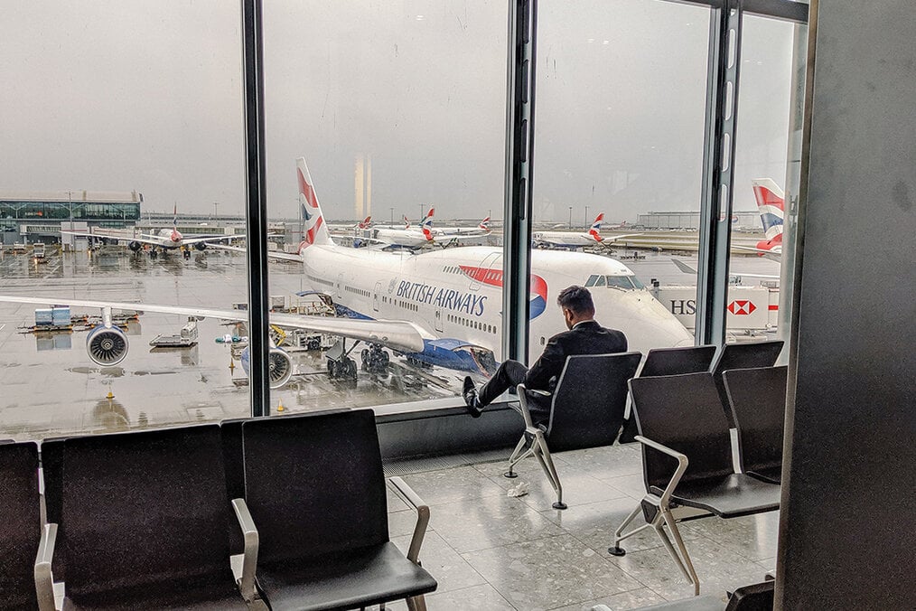 A man waiting to board a British Airways flight
